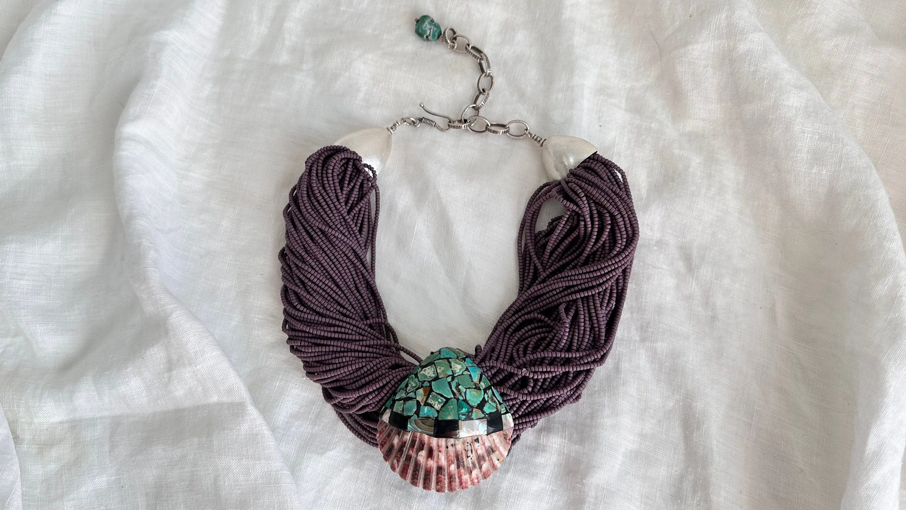 Kewa Pueblo Pendant on Multi-Strand Necklace. Shell, Turquoise, Glass, Silver.