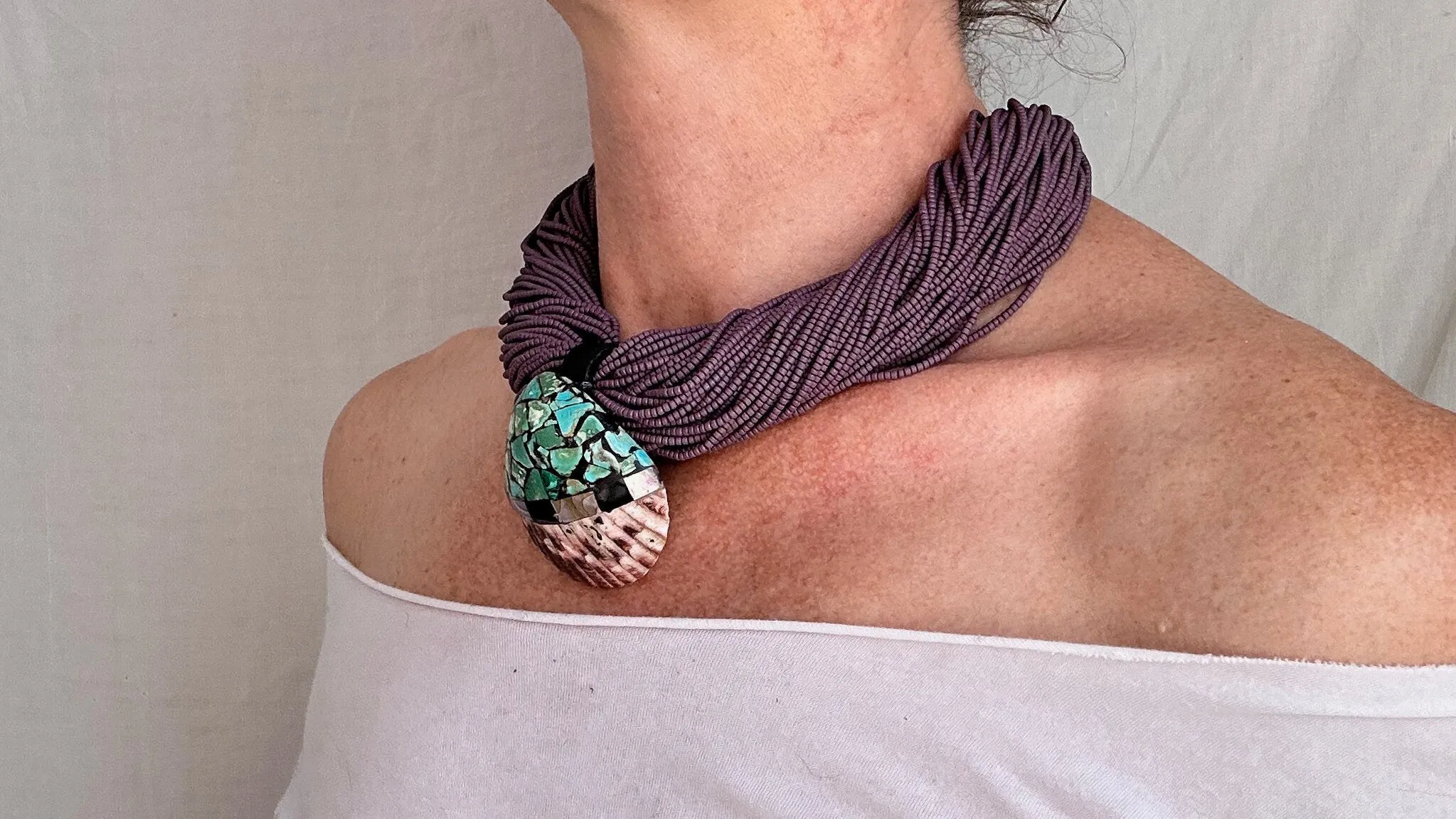 Kewa Pueblo Pendant on Multi-Strand Necklace. Shell, Turquoise, Glass, Silver.
