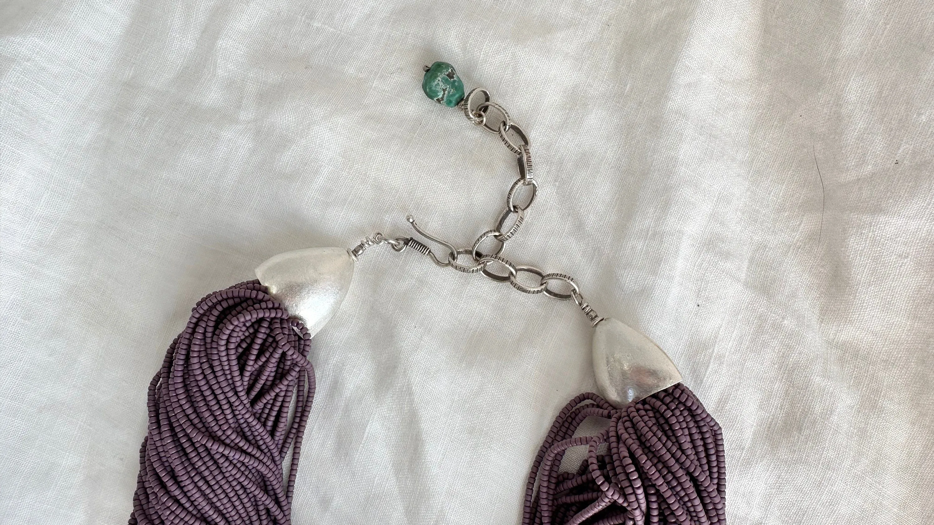Kewa Pueblo Pendant on Multi-Strand Necklace. Shell, Turquoise, Glass, Silver.