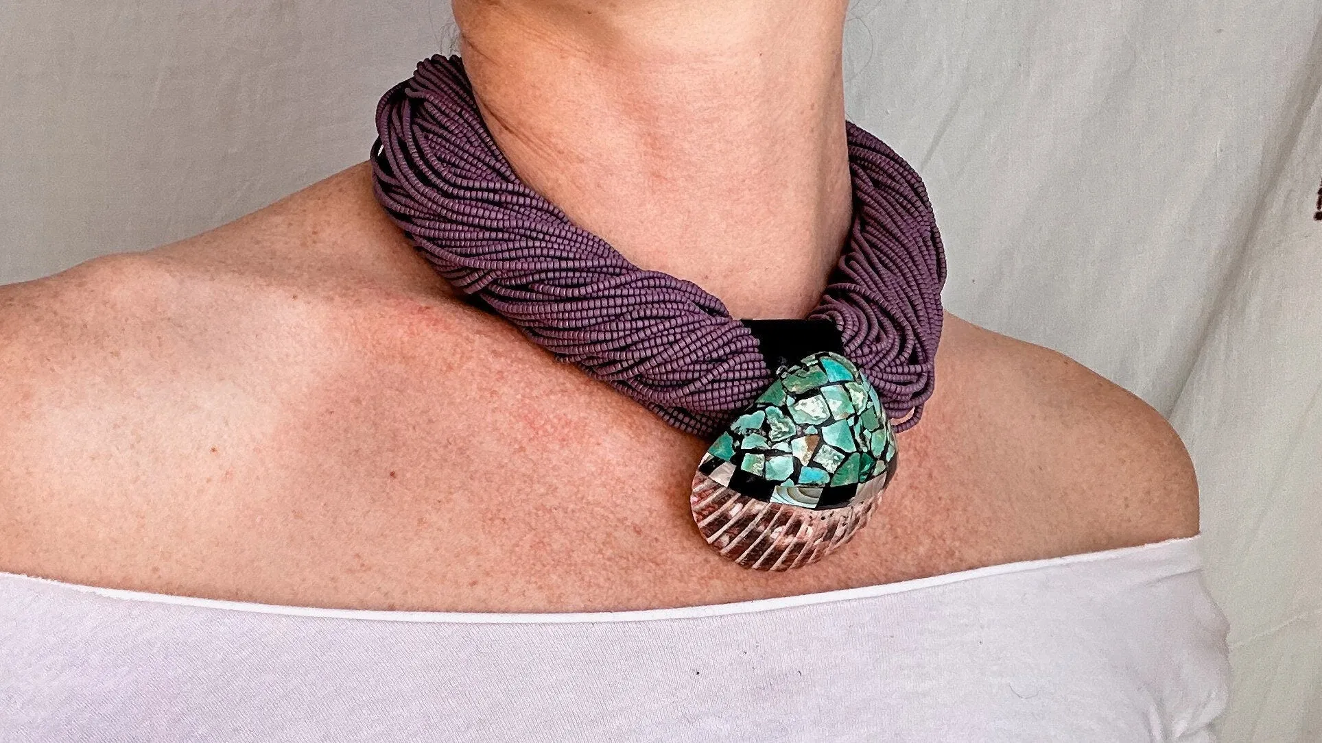 Kewa Pueblo Pendant on Multi-Strand Necklace. Shell, Turquoise, Glass, Silver.