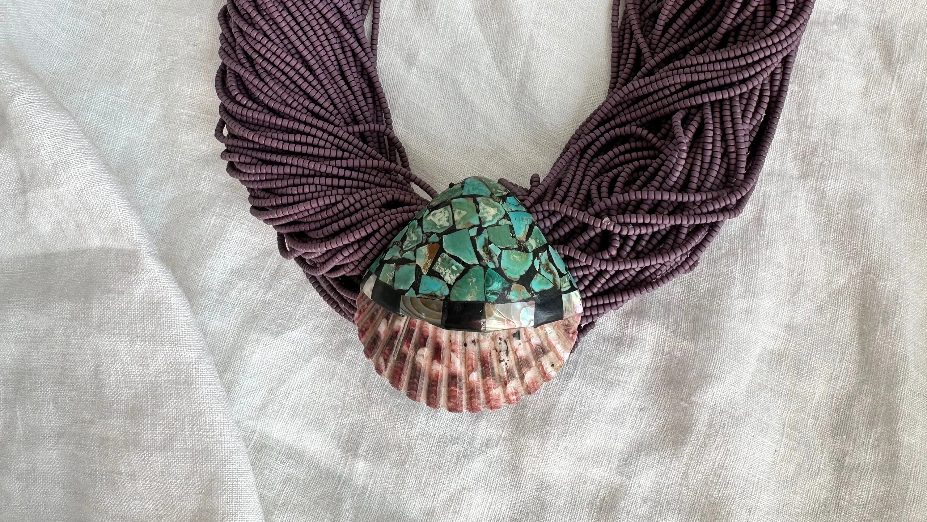 Kewa Pueblo Pendant on Multi-Strand Necklace. Shell, Turquoise, Glass, Silver.