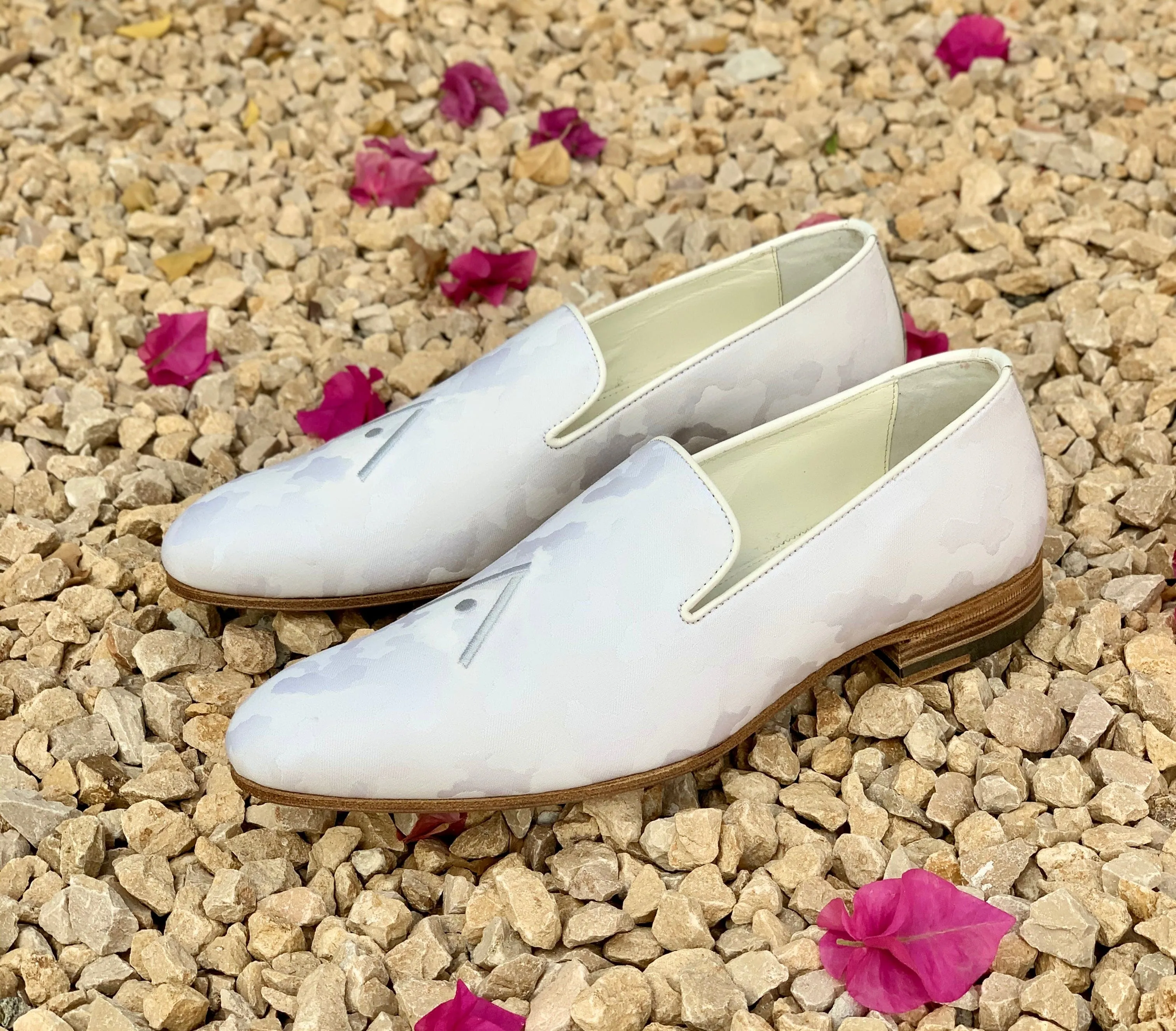 Certainly! To optimize the title for an e-commerce product, we can include important keywords and descriptive modifiers to make it more appealing and searchable. Heres a suggestion:

Luxurious Handmade Bespoke Leather Shoes by PIETER PETROS® - Customizable Designer Footwear