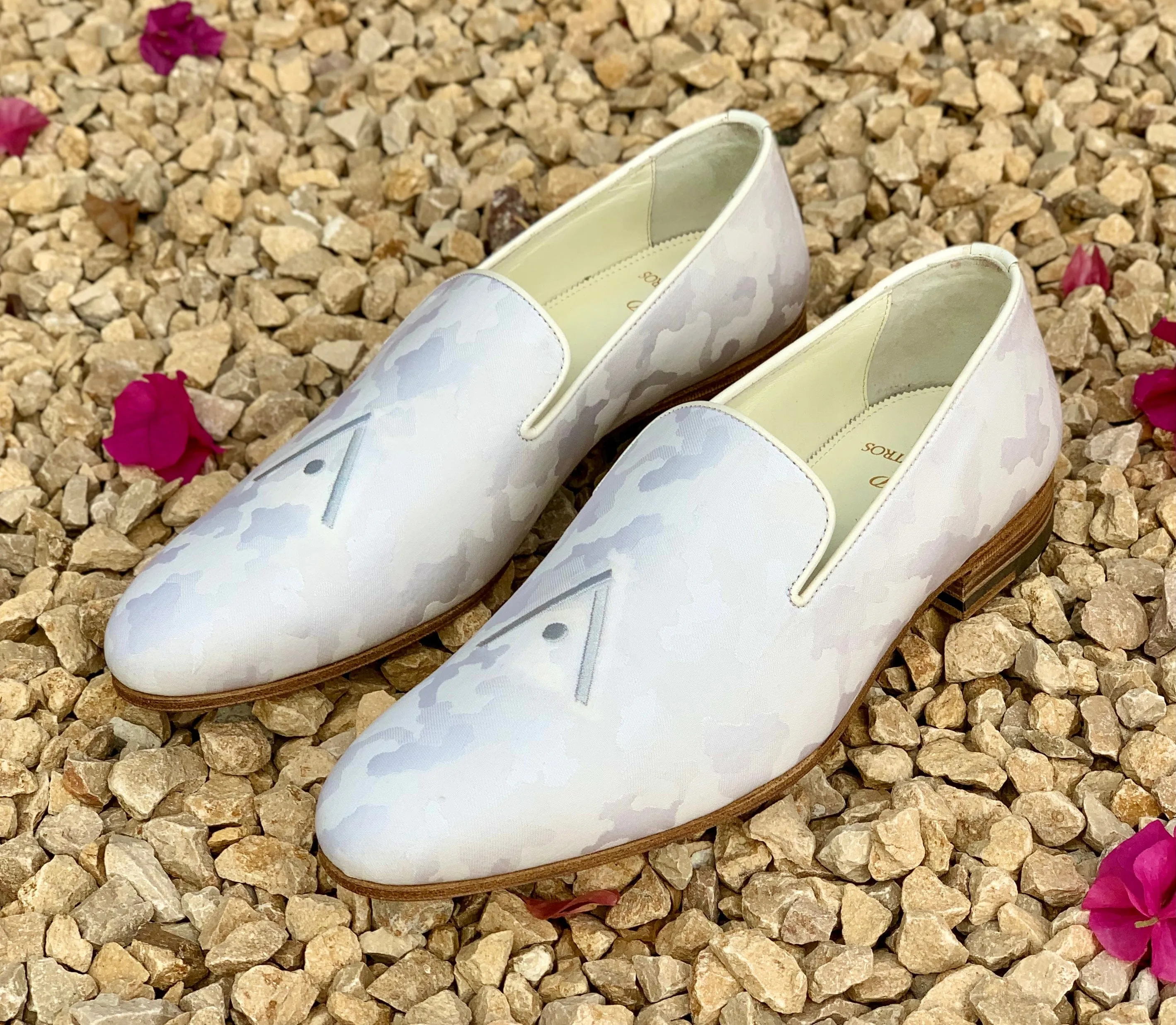 Certainly! To optimize the title for an e-commerce product, we can include important keywords and descriptive modifiers to make it more appealing and searchable. Heres a suggestion:

Luxurious Handmade Bespoke Leather Shoes by PIETER PETROS® - Customizable Designer Footwear